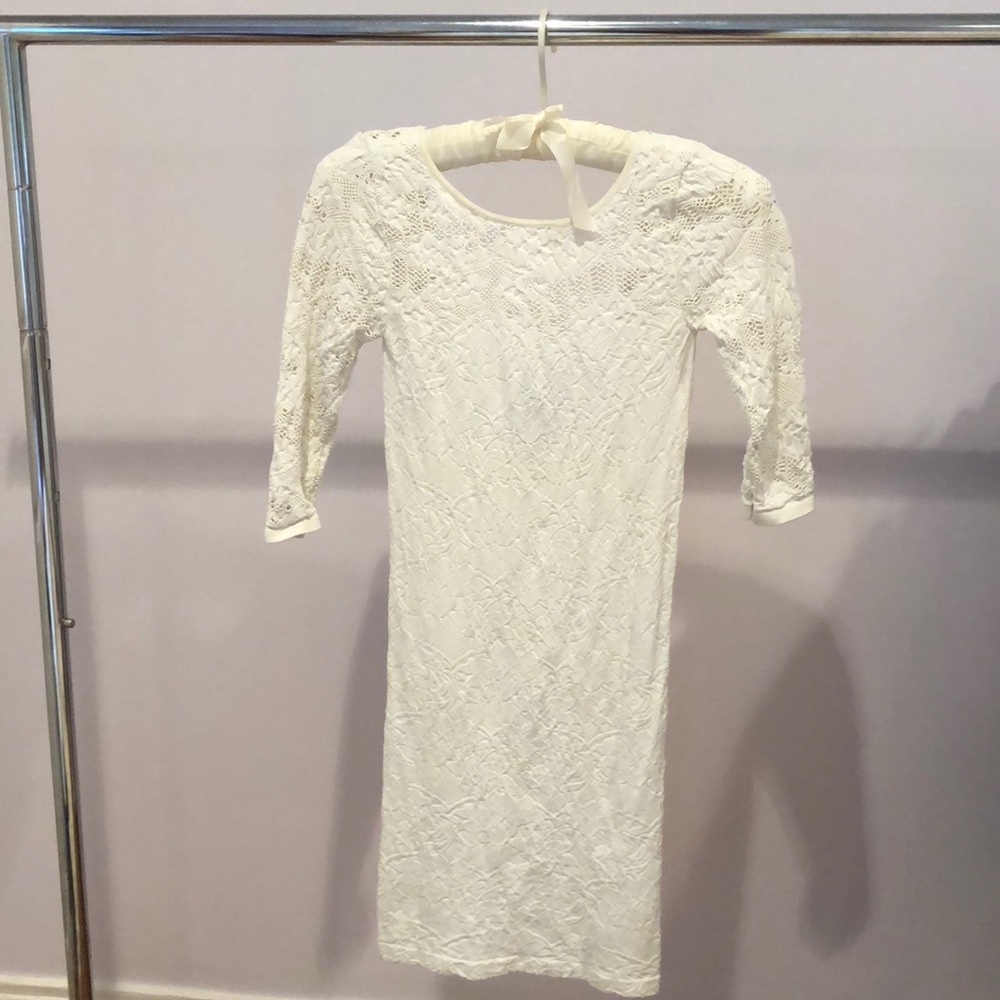 Tight white lace Bebe dress